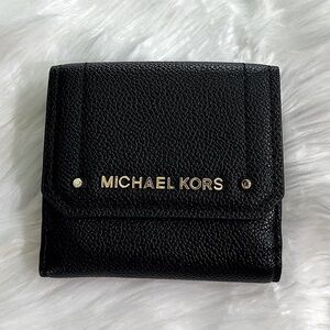 Michael Kors NWOT beautiful and basic black leather wallet